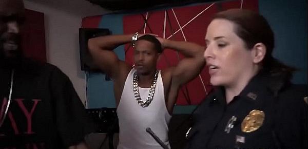  Two lusty female cops suck large black dick before stud bangs one of them